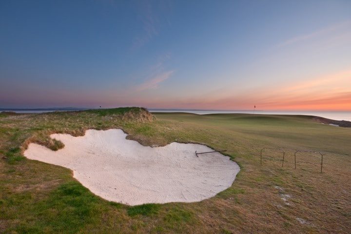 Bunker on a golf course at sunrise