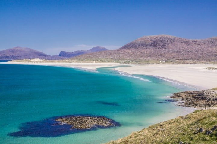 Picturesque empty white sand beach on Isle of Lewis in Scotland
