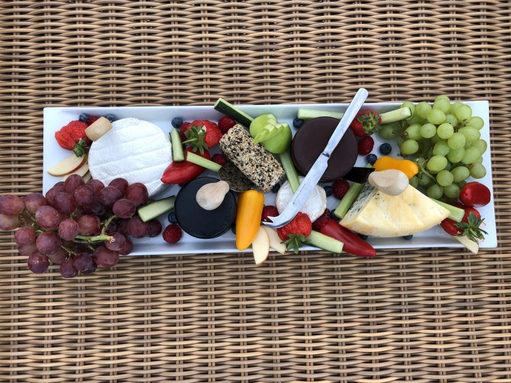 Cheeses and grapes on a platter